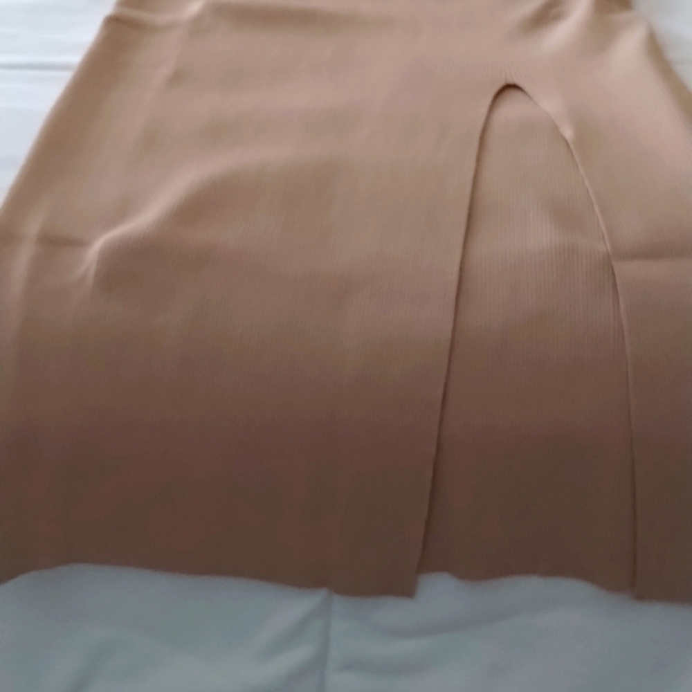 Maxi stretchy skirt with front slit. Bought for myself but too long for me.